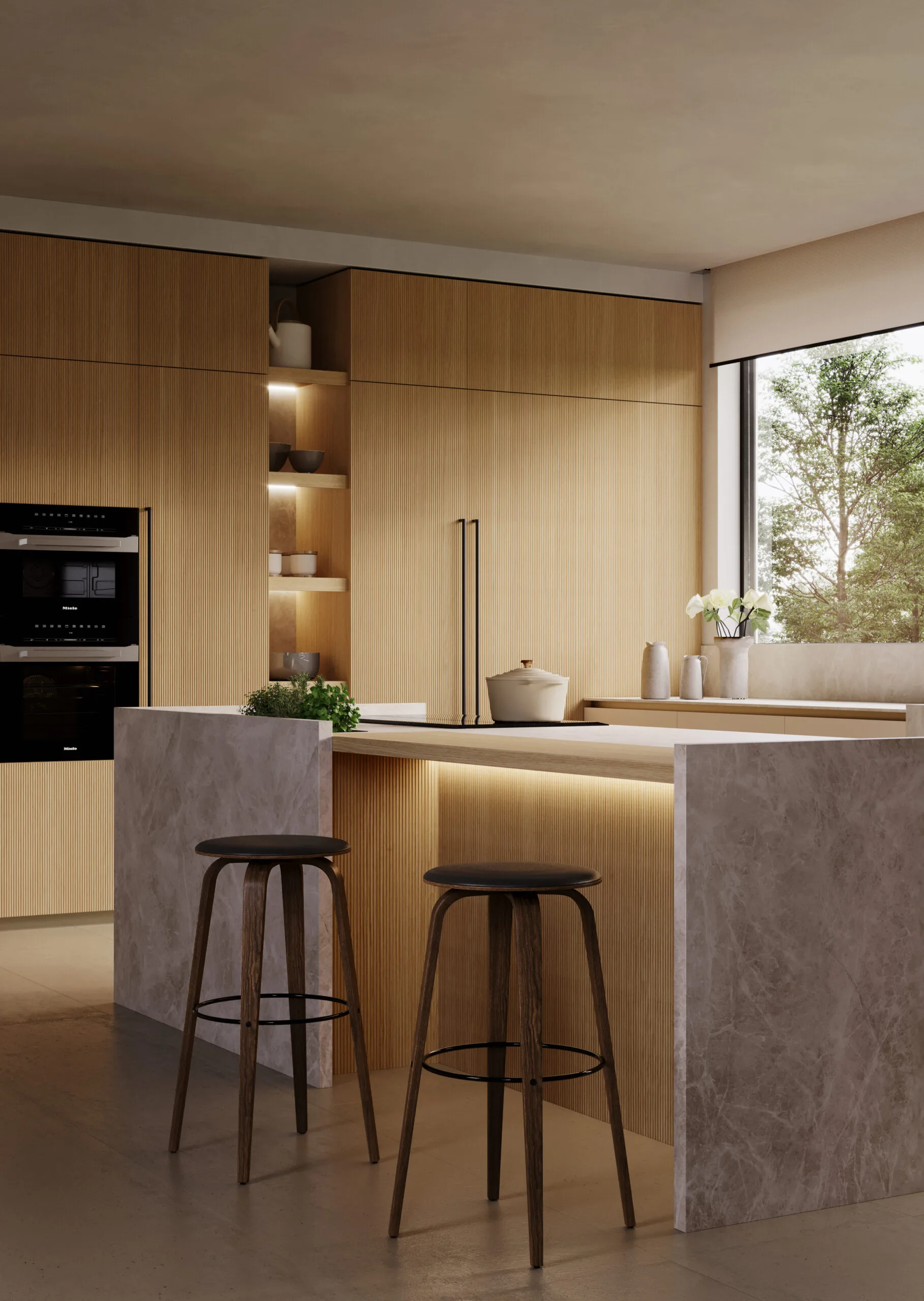 Détail d'un îlot central Zecchinon — plan de travail en pierre claire, finitions bois noyer — cuisine sur mesure à Biarritz